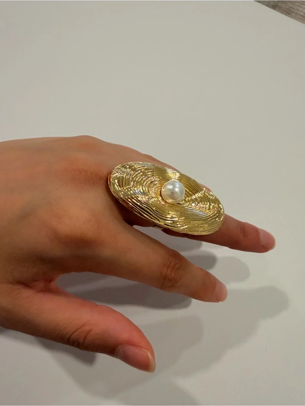 Gold Oval Textured Ring with Pearl Accent